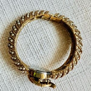Vintage base metal Basel hidden watch bracelet.gold plated w seeded pearls.